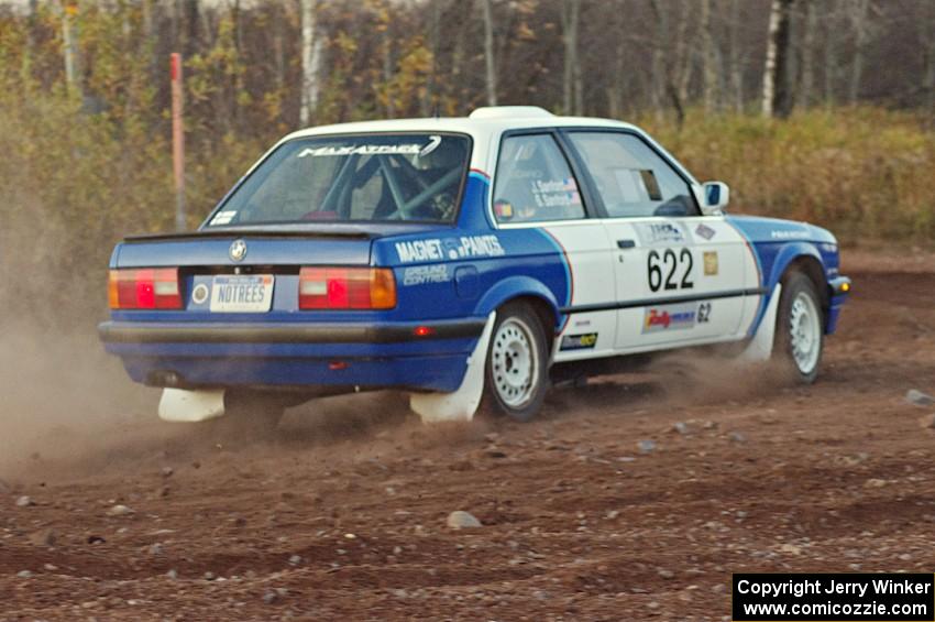 Scott Sanford / Joel Sanford in their BMW 325i on the practice stage