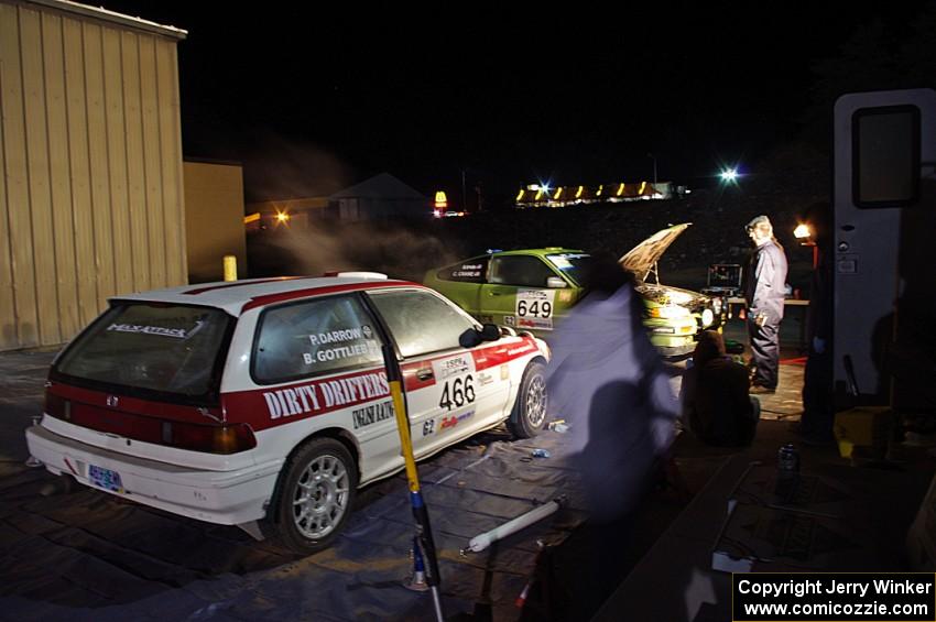 The Brian Gottlieb / Pat Darrow Toyota FX-16 and Cody Crane / Billy Irvin Honda CRX get final prep the night before the rally.