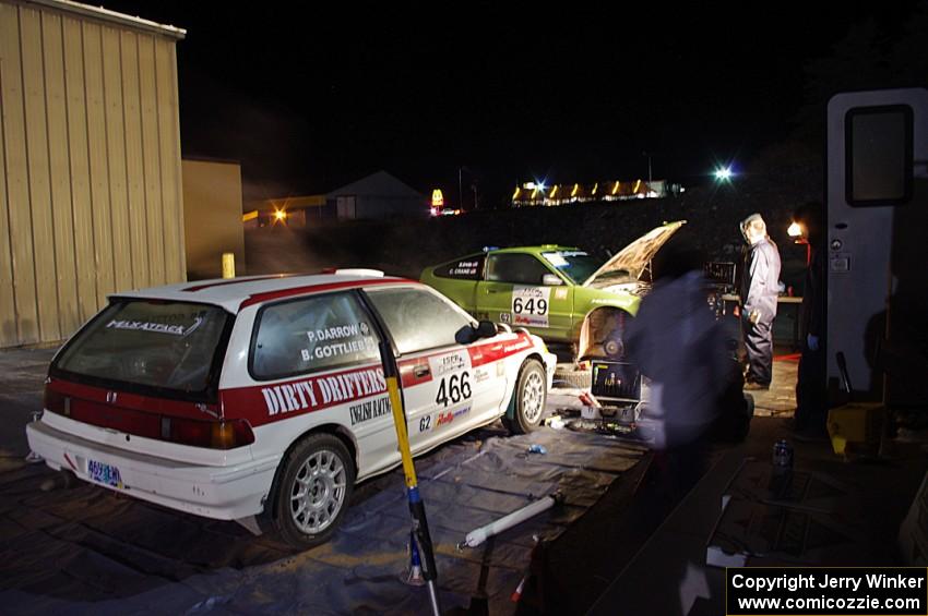 The Brian Gottlieb / Pat Darrow Toyota FX-16 and Cody Crane / Billy Irvin Honda CRX get final prep the night before the rally.