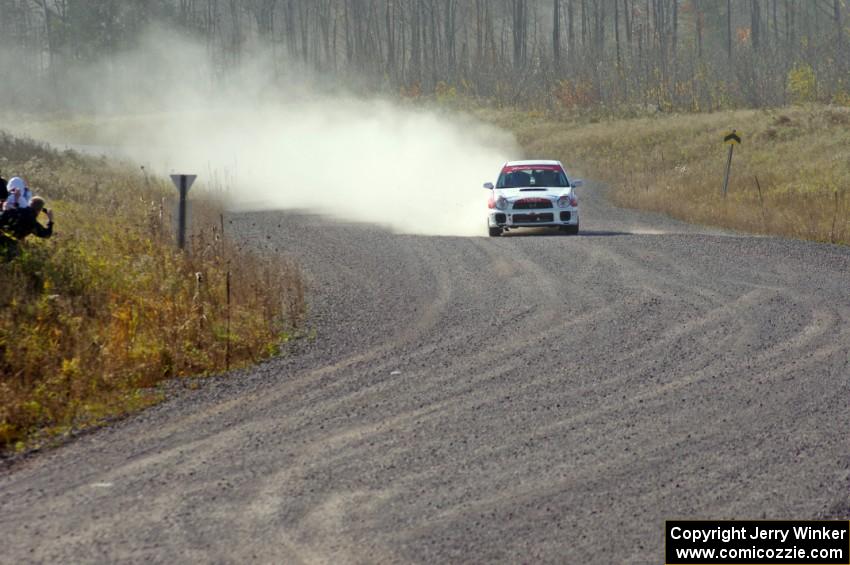 Yurek Cienkosz / Mariusz Malik in their Subaru WRX on SS1 (Green Acres I)