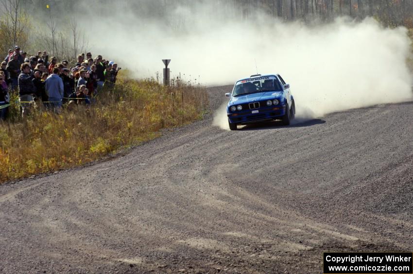 Scott Sanford / Joel Sanford in their BMW 325i on SS1 (Green Acres I)