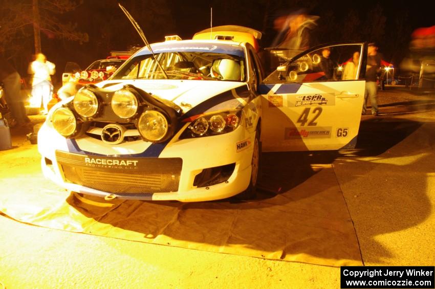 The Eric Burmeister / Dave Shindle Mazda MAZDASPEED 3 at Kenton service before SS8 (Bob Lake)