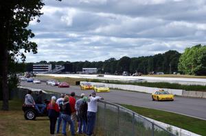 The field bunches up behind the pace car after Chuck Cassaro's wreck.