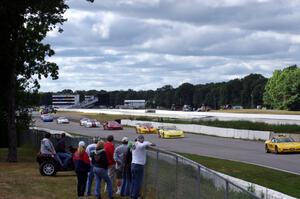 The field bunches up behind the pace car after Chuck Cassaro's wreck.