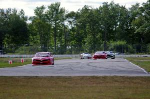 TA2 battle: 1. Cameron Lawrence, 2. Pete Halsmer and 3. Gregg Rodgers, all in Chevy Camaros.