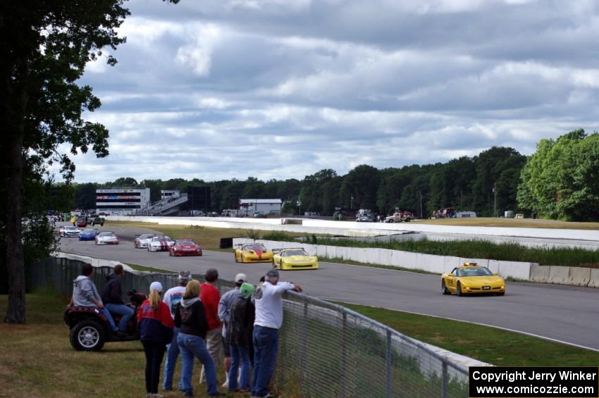 The field bunches up behind the pace car after Chuck Cassaro's wreck.