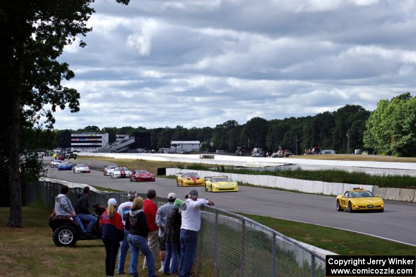 The field bunches up behind the pace car after Chuck Cassaro's wreck.