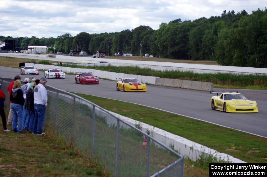 The top five come into turn one under yellow.