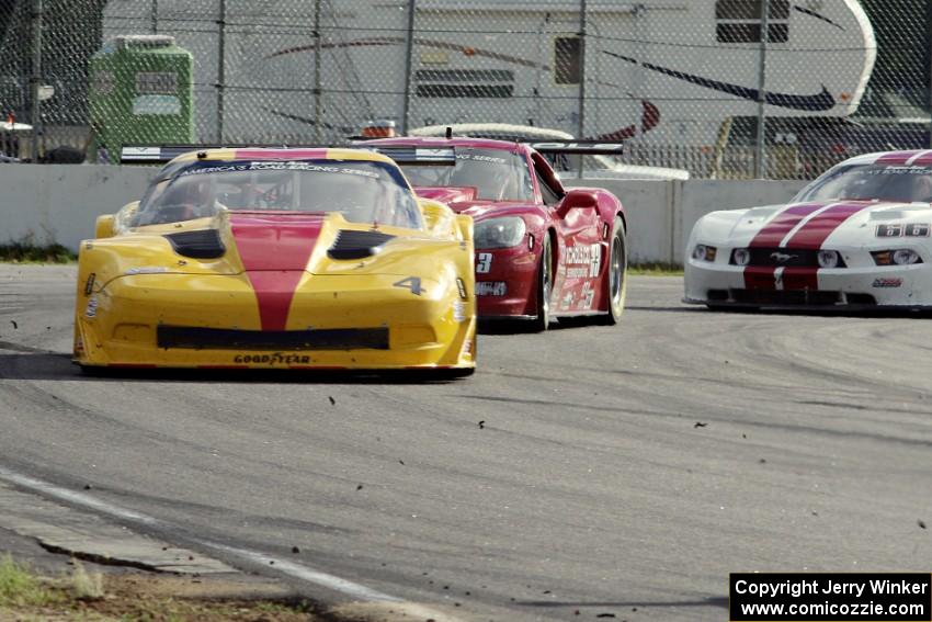 Tony Ave's Chevy Corvette, Amy Ruman's Chevy Corvette and Cliff Ebben's Ford Mustang