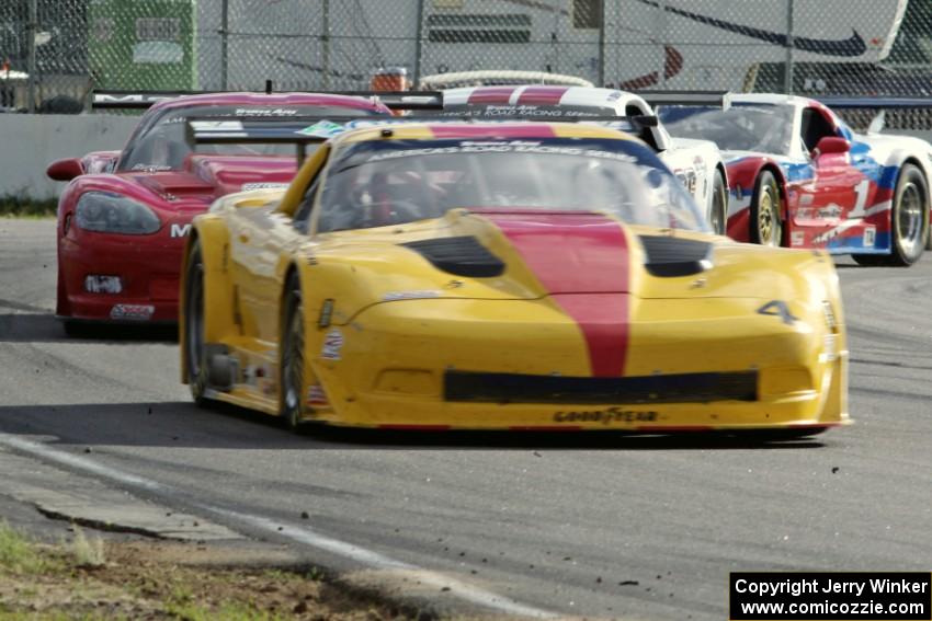 Tony Ave's Chevy Corvette, Amy Ruman's Chevy Corvette, Cliff Ebben's Ford Mustang and Simon Gregg's Chevy Corvette