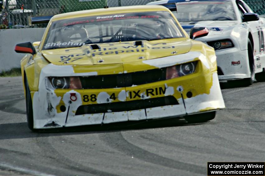 Tom Sheehan's Chevy Camaro and Joe Ebben's Ford Mustang