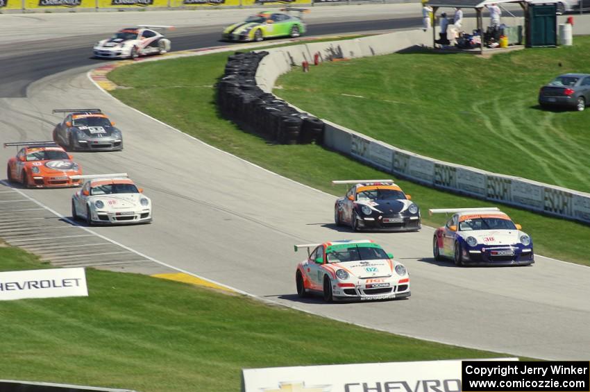 Porsche GT3 Cup cars head uphill on the cool off lap