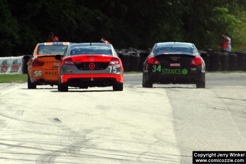 Jesse Combs / Jeff Mosing BMW 328i, Adam Burrows / Ray Mason Honda Civic Si and Ryan Ellis/Patricio Jourdain Nissan Altima Coupe