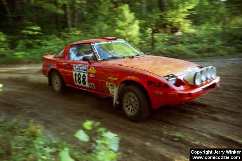 Andrew Havas / Scott Slingerland Mazda RX-7 at a 90-right on SS1, Akeley Cutoff.