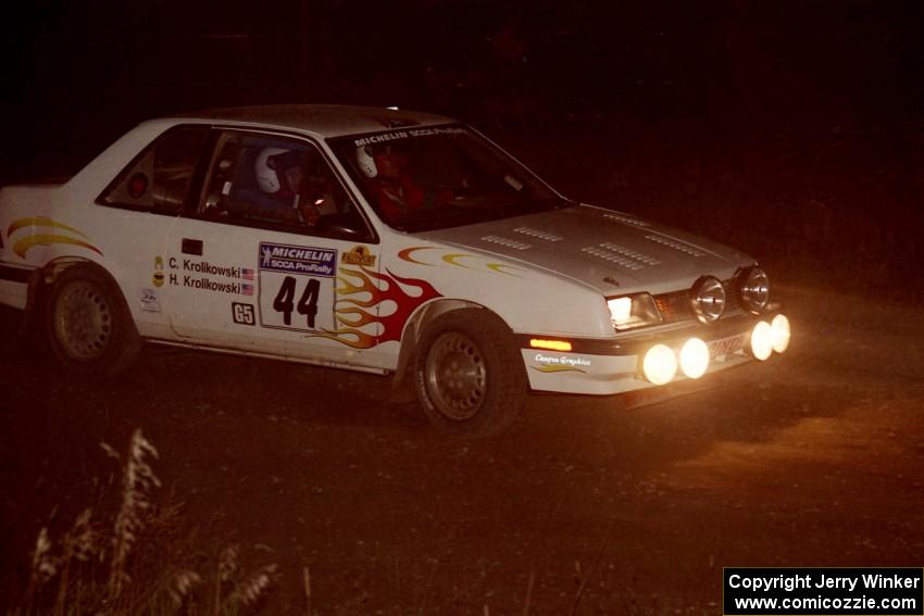 Henry Krolikowski / Cindy Krolikowski Dodge Shadow at speed through the crossroads on SS6, East Steamboat.