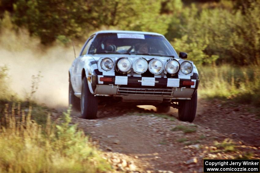 Cable Rhodes / Tyler Rhodes Mazda RX-7 comes into the spectator corner on SS8, Limestone I.