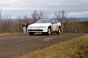 Chris Czyzio / Eric Carlson Mitsubishi Eclipse GSX at the final yump on SS14, Brockway Mountain I.