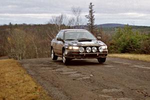 Pat Richard / Claire Chizma Subaru Impreza 2.5RS at the final yump on SS14, Brockway Mountain I.