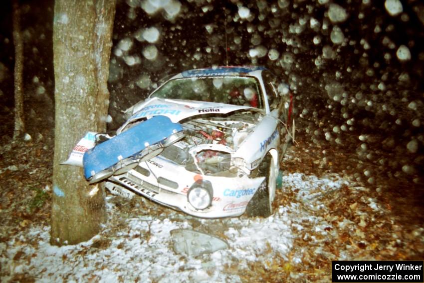 Noel Lawler / Charles Bradley Hyundai Tiburon crashed heavily into a tree at the flying finish of SS5, Passmore.