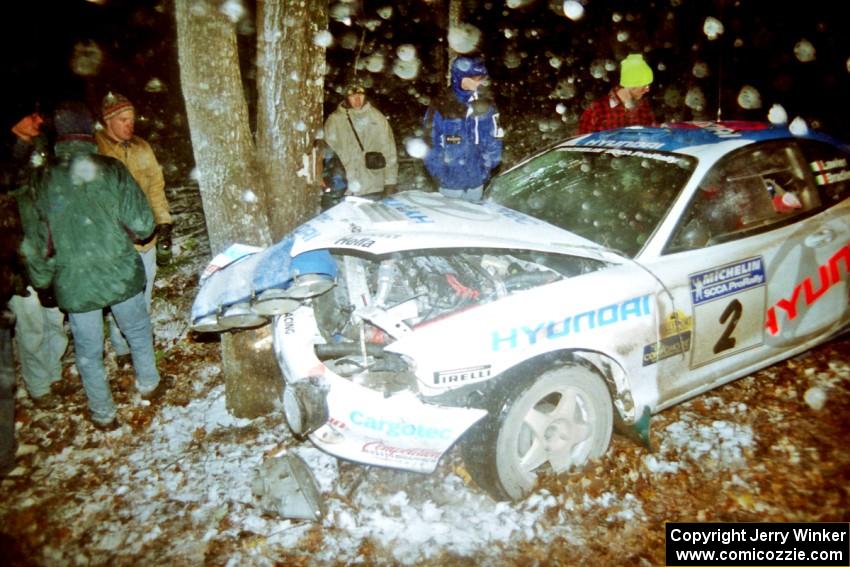 Noel Lawler / Charles Bradley Hyundai Tiburon crashed heavily into a tree at the flying finish of SS5, Passmore.