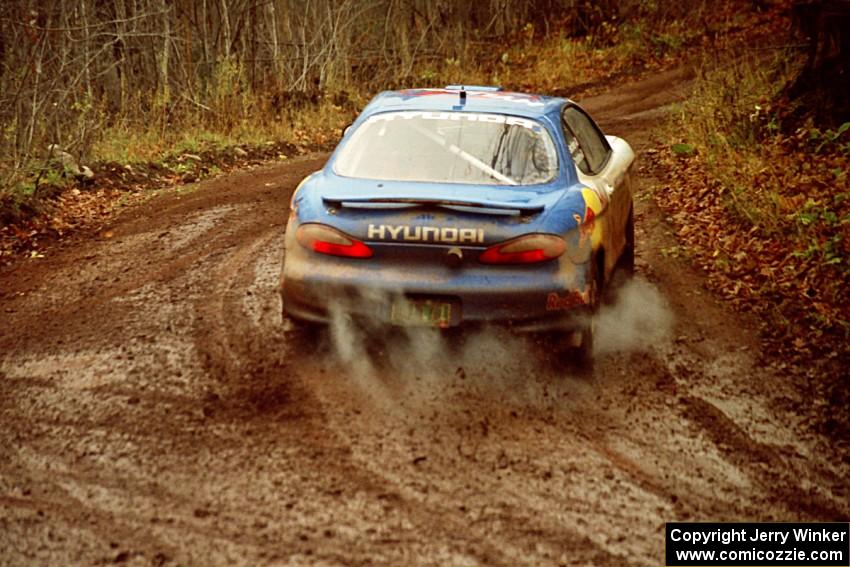 Paul Choiniere / Jeff Becker Hyundai Tiburon at the final corner of SS11, Gratiot Lake I.