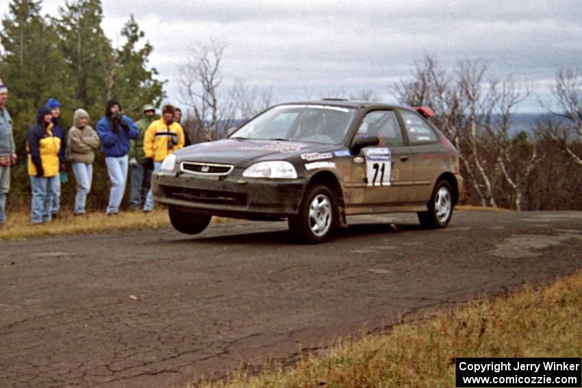 Bryan Hourt / Pete Cardimen Honda Civic at the final yump on SS14, Brockway Mountain I.