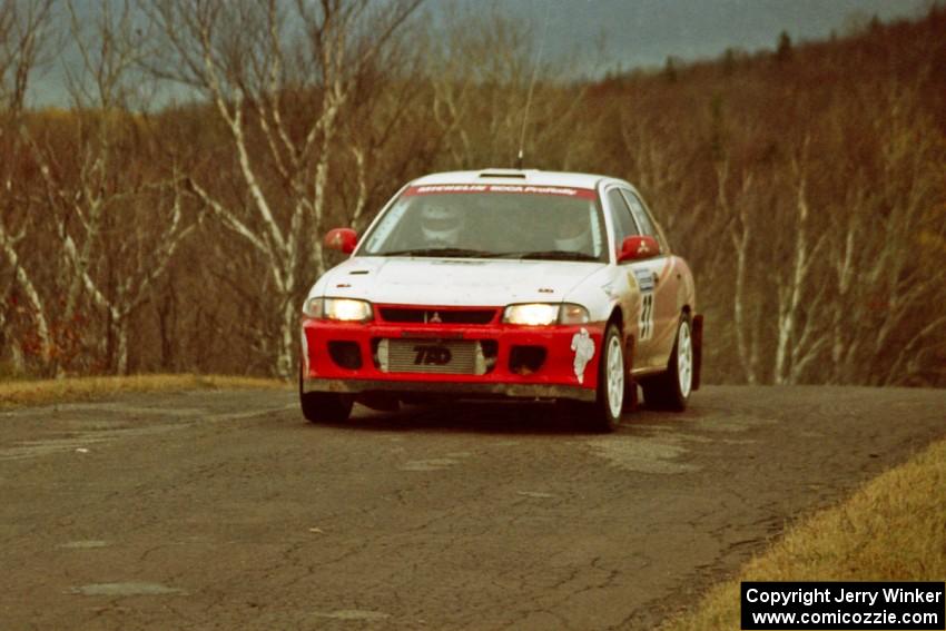 Henry Joy IV / Chris Griffin Mitsubishi Lancer Evo II at the final yump on SS14, Brockway Mountain I.