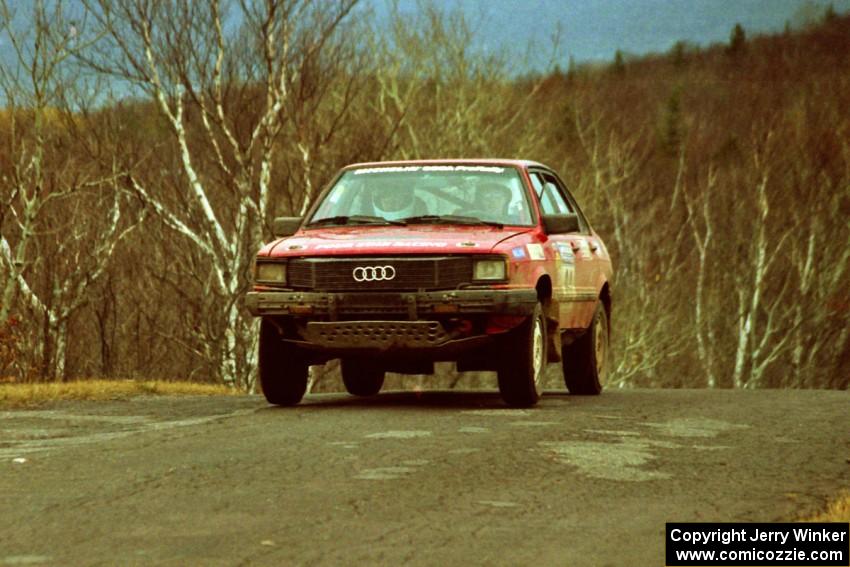 Jon Kemp / Rod Hendricksen Audi 4000 Quattro at the final yump on SS14, Brockway Mountain I.