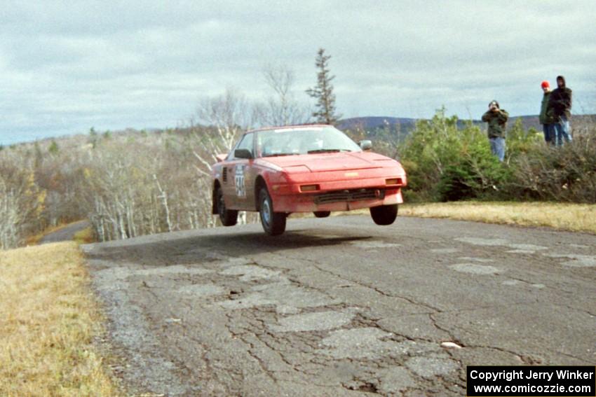 Chris Gilligan / Joe Petersen Toyota MR-2 at the final yump on SS14, Brockway Mountain I.