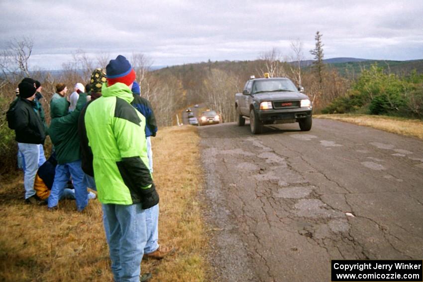 Sweep trucks at the final yump on SS14, Brockway Mountain I.