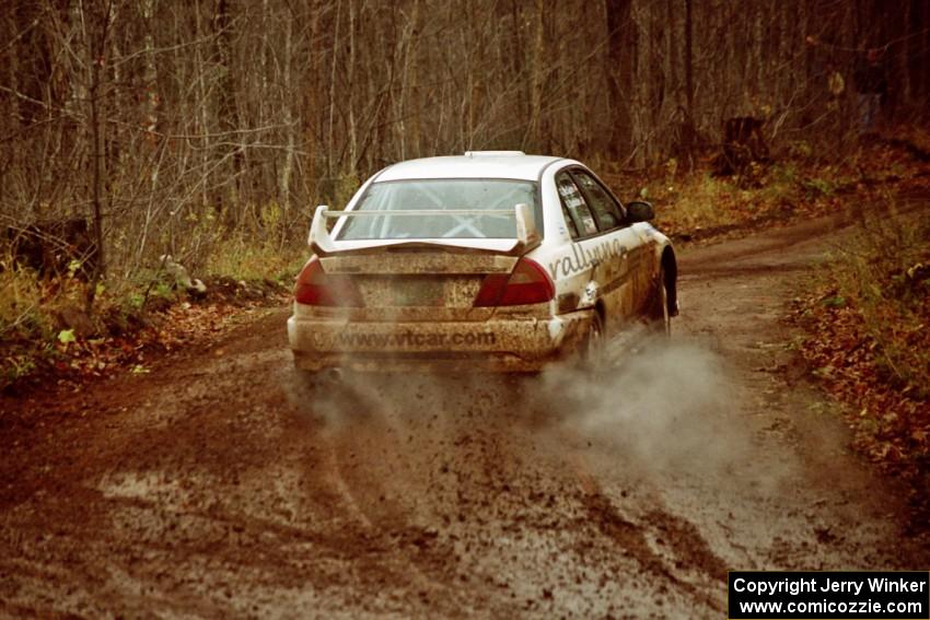 Karl Scheible / Gail McGuire Mitsubishi Lancer Evo V at the final corner of SS11, Gratiot Lake I.