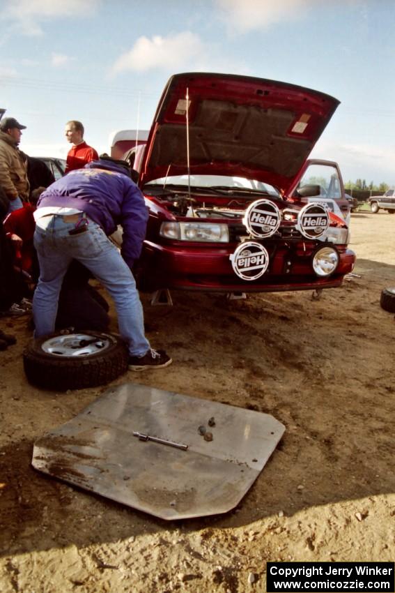 Todd Erickson works on the Eric Seppanen / Jake Himes Nissan Sentra SE-R at service.