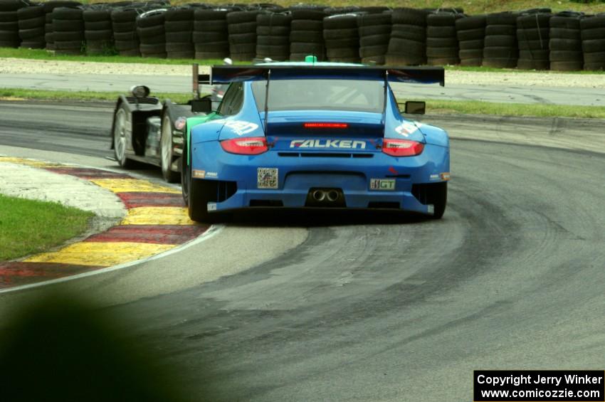 Wolf Henzler / Bryan Sellers Porsche GT3 RSR follows the Scott Tucker / Simon Pagenaud HPD ARX-03b Honda