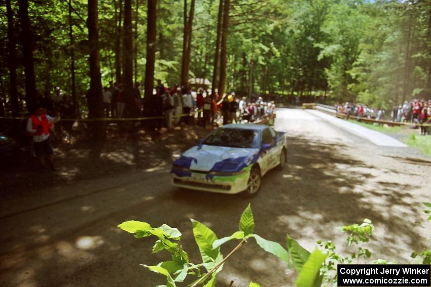 Celsus Donnelly / Shane Mitchell Eagle Talon goes straight at the Asaph Campground spectator location on SS4, Phasa.