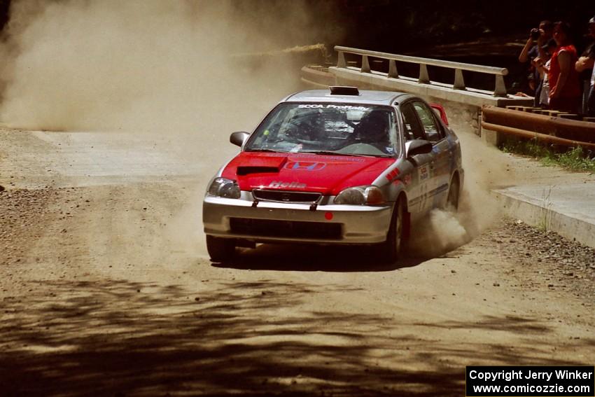 Nick Robinson / Carl Lindquist Honda Civic at the Asaph Campground spectator location on SS4, Phasa.