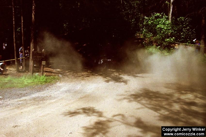 Jens Larsen / Bob Barrall Mazda RX-7 at the Asaph Campground spectator location on SS4, Phasa.