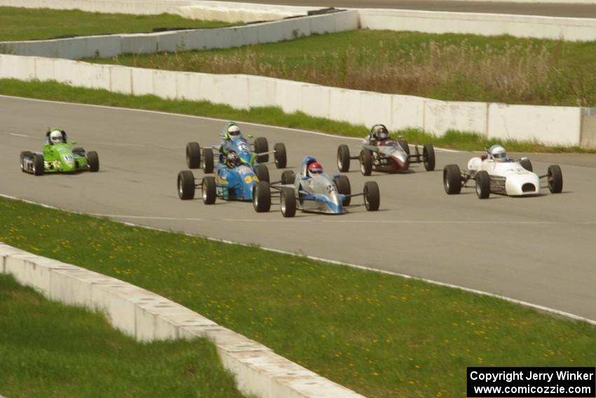 The small formula car field consisted of just six cars seen here taking the green flag.