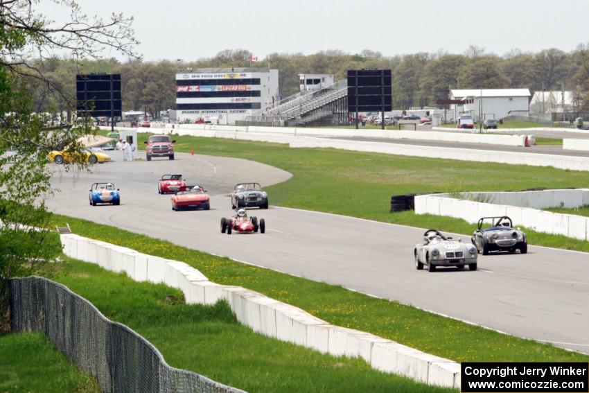 The field comes into the first turn after the green flag.