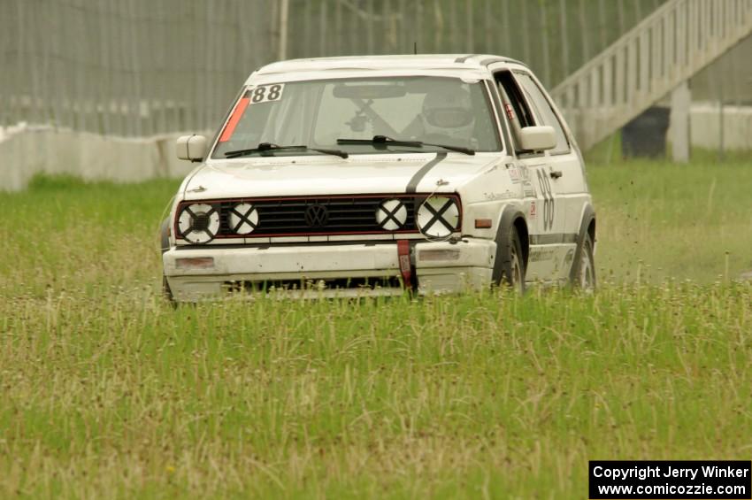 JAB Motorsport VW GTI slides off the track at turn 12.