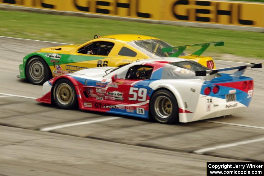 John Baucom's Ford Mustang and Simon Gregg's Chevy Corvette