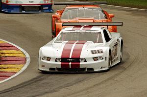 Denny Lamers' Ford Mustang and David Fershtand's Chevy Corvette