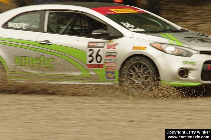 Jason Wolfe's Kia Forte Koup goes straight off at turn 12.