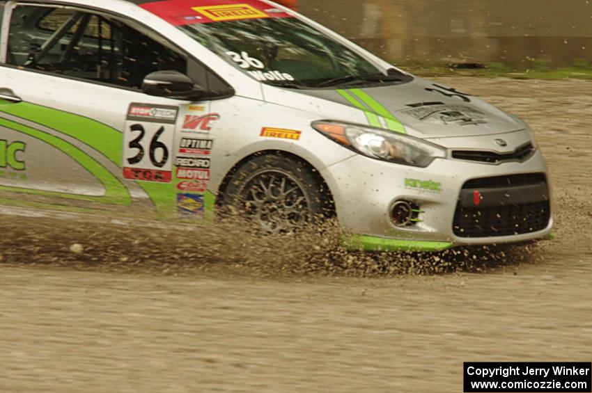 Jason Wolfe's Kia Forte Koup goes straight off at turn 12.