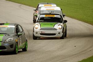 Nate Stacy's Ford Fiesta, Jason Fichter's MINI Cooper, Chris Capaldi's Ford Fiesta and Jim Cleveland's MINI Cooper