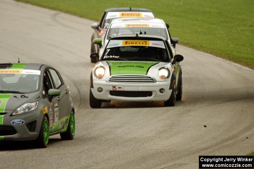 Nate Stacy's Ford Fiesta, Jason Fichter's MINI Cooper, Chris Capaldi's Ford Fiesta and Jim Cleveland's MINI Cooper