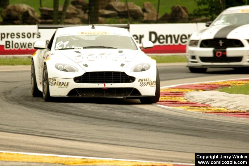 Jorge De La Torre's Aston Martin Vantage GT4 and Chris Outzen's Ford Mustang Boss 302S