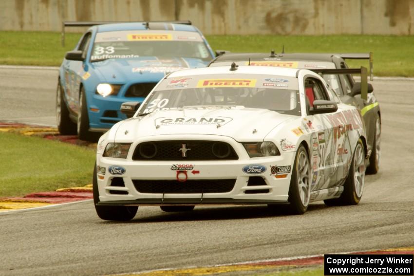 Dean Martin's Ford Mustang Boss 302S, Lawson Aschenbach's Chevy Camaro and Tony Buffomante's Ford Mustang Boss 302S