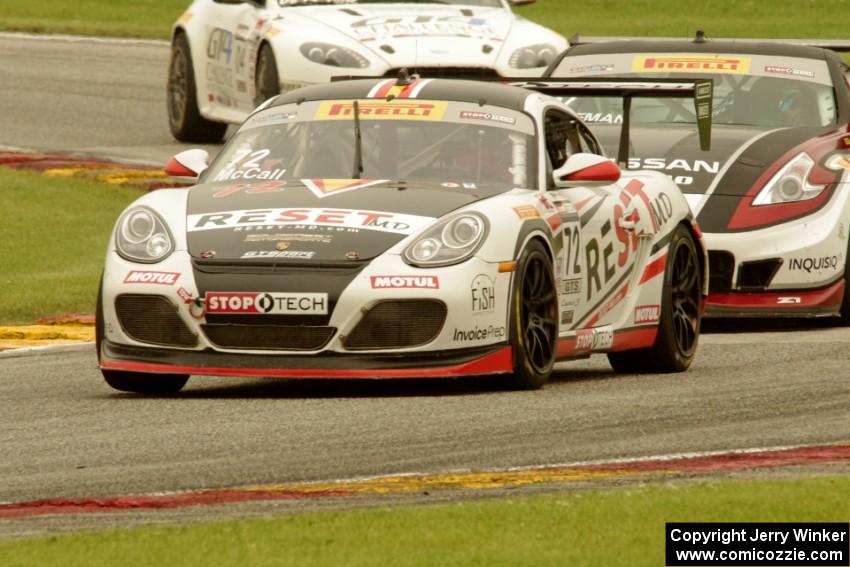 Buz McCall's Porsche Cayman S, Brian Kleeman's Nissan 370Z and Jorge De La Torre's Aston Martin Vantage GT4