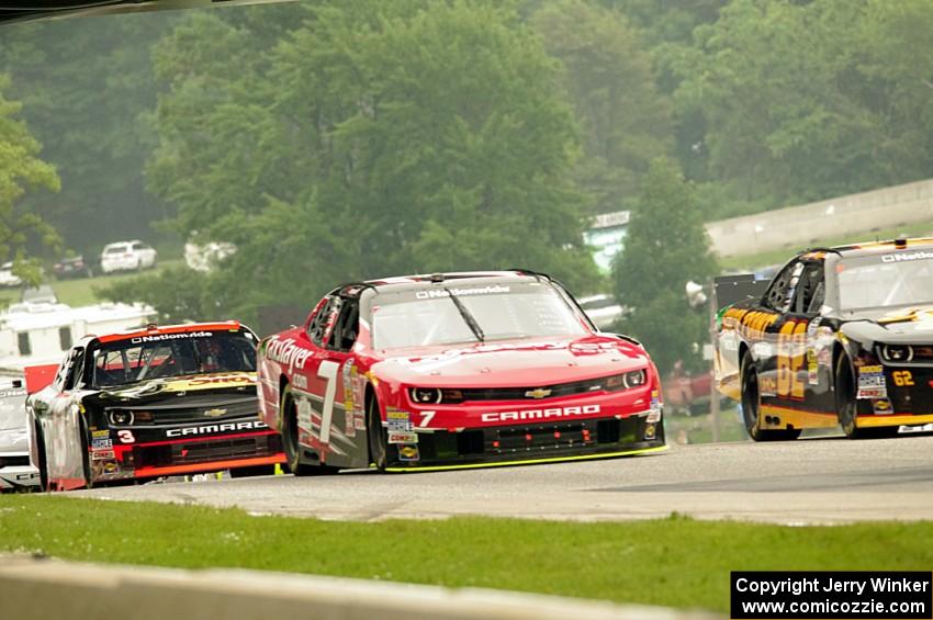 Brendan Gaughan's Chevy Camaro, Regan Smith's Chevy Camaro and Ty Dillon's Chevy Camaro