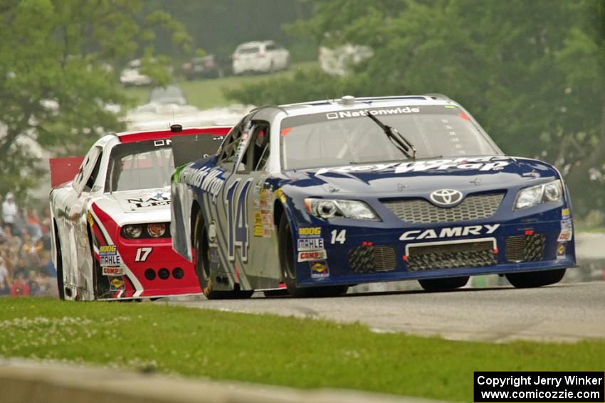 Eric McClure's Toyota Camry and Tanner Berryhill's Dodge Challenger